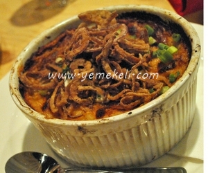 güveçte turşulu pilav